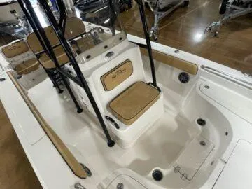 Slide: The Image of 2024 Sea Chaser LX boat interior with tan seating and sleek design. - 6