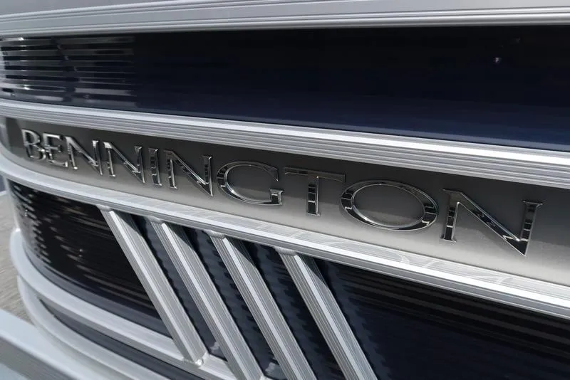 Slide: The Image of 2024 Bennington L Entertainment 23 LPD boat logo in sleek metallic finish. - 10