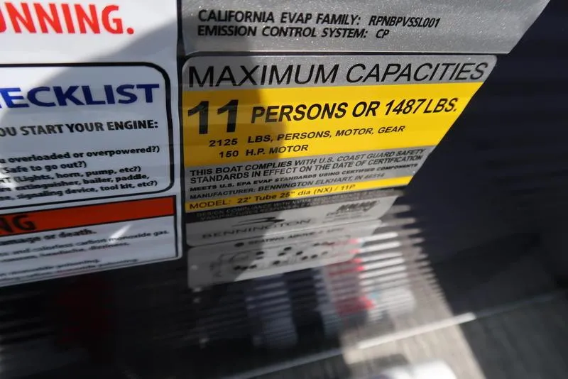 Slide: The Image of 2024 Bennington L Entertainment 23 LPD capacity label, 11 persons or 1487 lbs, 150 HP motor. - 23