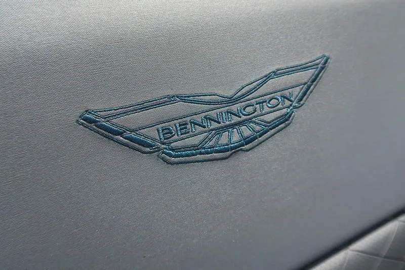 Slide: The Image of 2024 Bennington L Entertainment 23 LPD logo on gray upholstery. - 27