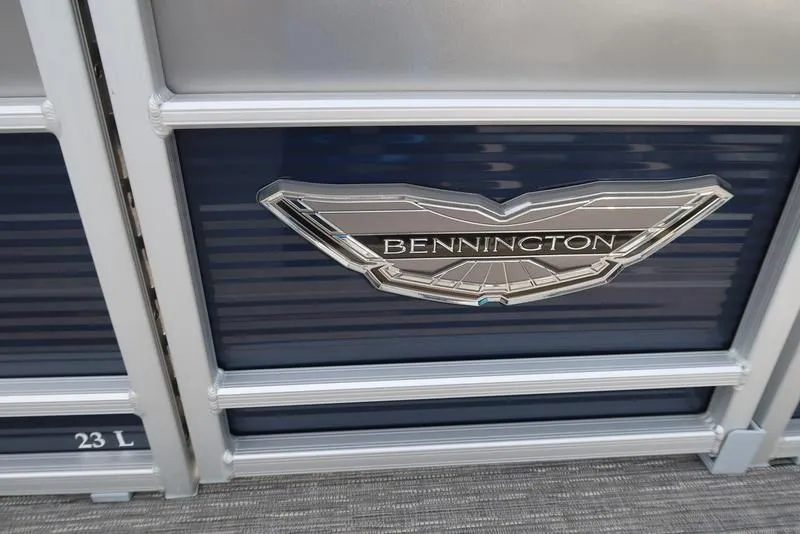 Slide: The Image of 2024 Bennington L Entertainment 23 LPD logo on boat panel. - 32
