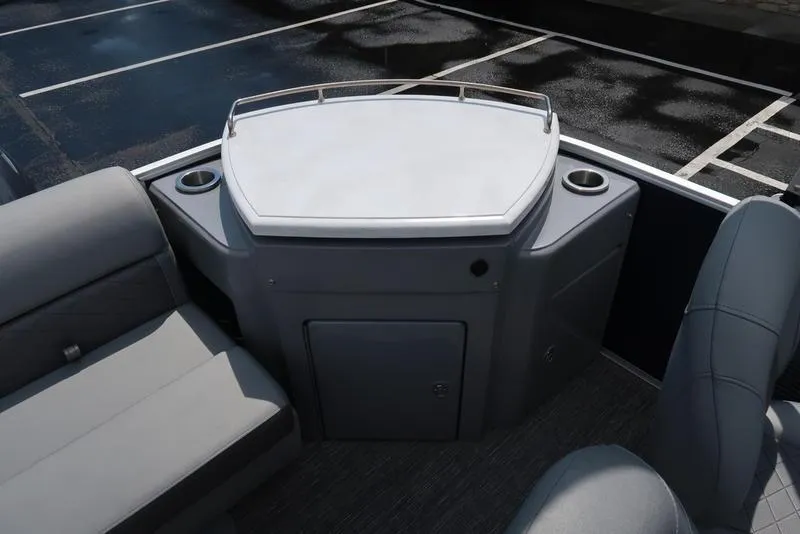 Slide: The Image of 2024 Bennington L Entertainment 23 LPD boat interior with seating and table. - 9