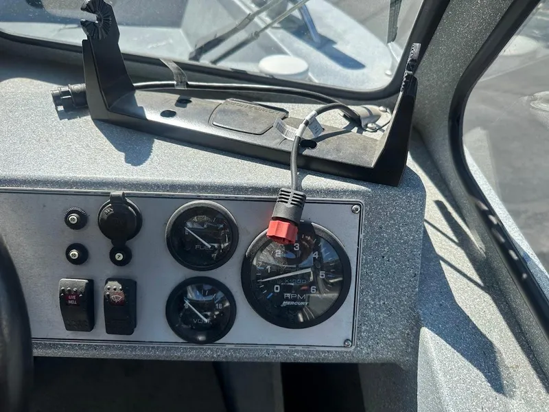 Slide: The Image of Dashboard of a 2008 Jetcraft 1925 Adventurer boat with gauges and controls. - 21