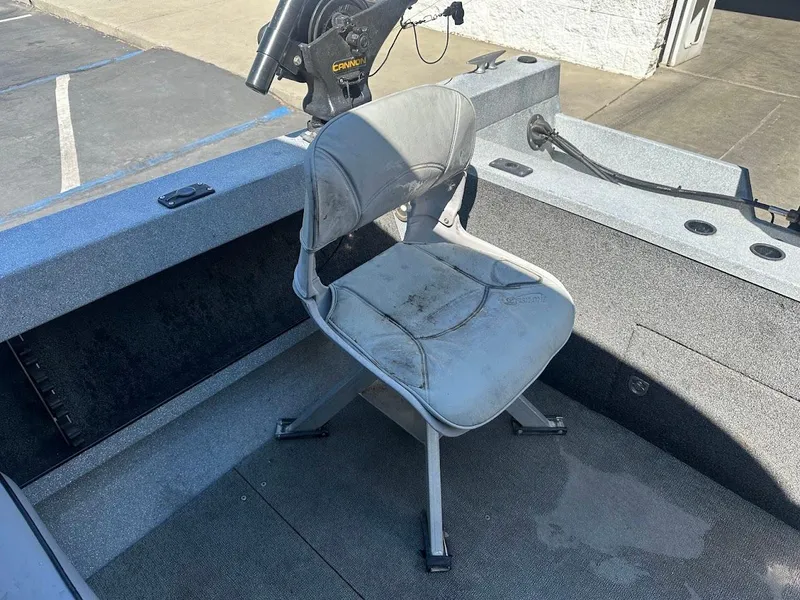 Slide: The Image of Jetcraft 1925 Adventurer 2008 boat interior with a single seat and fishing equipment. - 28