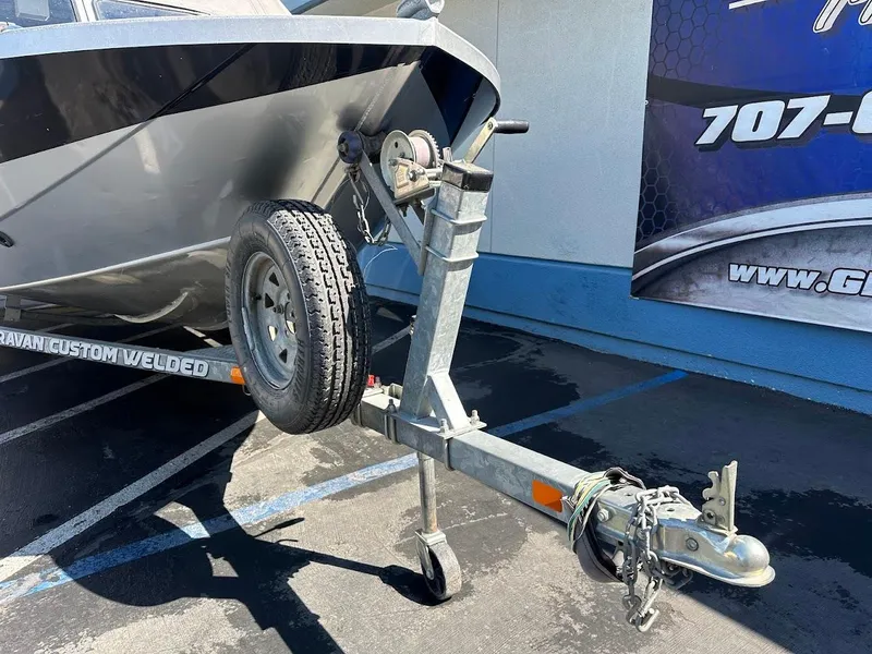 Slide: The Image of Trailer hitch of a 2008 Jetcraft 1925 Adventurer boat in a parking lot. - 4