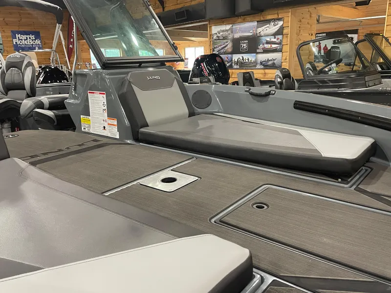 Slide: The Image of 2025 Lund 185 Impact GL boat interior with sleek seating and modern design. - 6