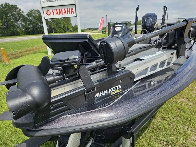 Slide: The Image of 2023 Skeeter ZXR 20 boat with Minn Kota Ultrex motor, Yamaha sign in background. - 3