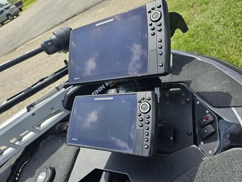 Slide: The Image of Dual Humminbird fish finders on a 2023 Skeeter ZXR 20 boat dashboard. - 4