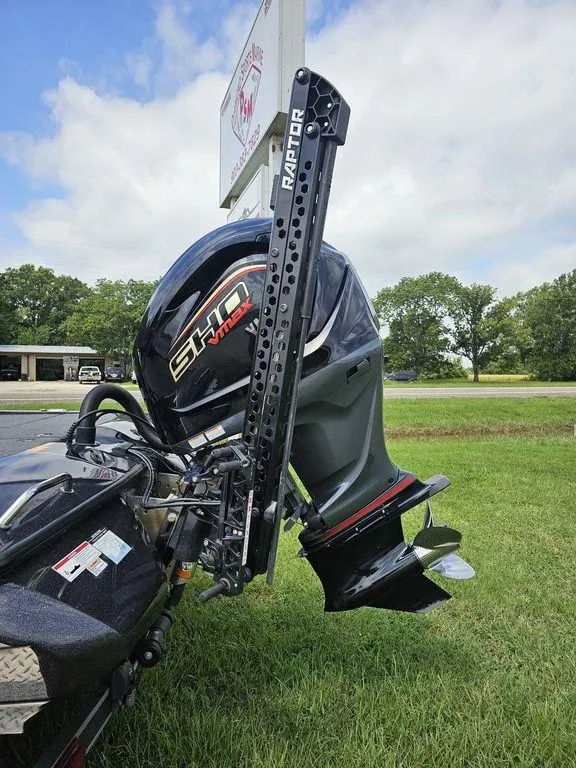 Slide: The Image of 2023 Skeeter ZXR 20 boat with Raptor anchor and powerful outboard motor. - 7