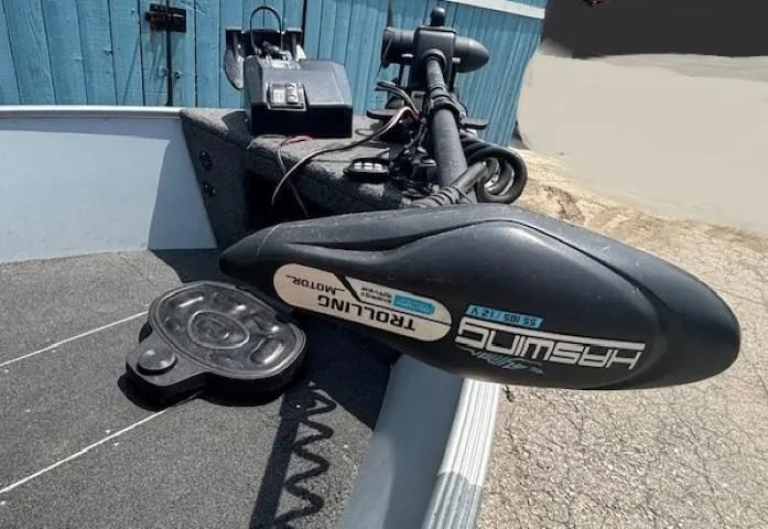 Slide: The Image of 2013 Lund 1400 Fury SS boat with trolling motor and control panel. - 8