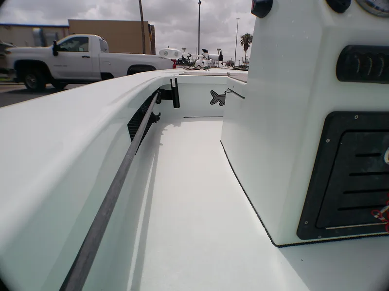 Slide: The Image of 2016 Ankona Copperhead boat interior with control panel and rod holder. - 11