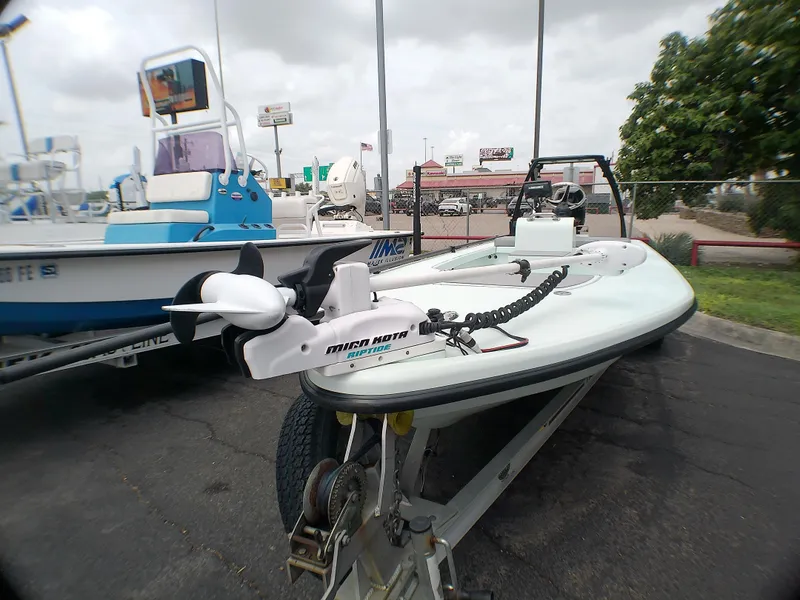 Slide: The Image of 2016 Ankona Copperhead boat with Minn Kota Riptide motor on a trailer. - 4