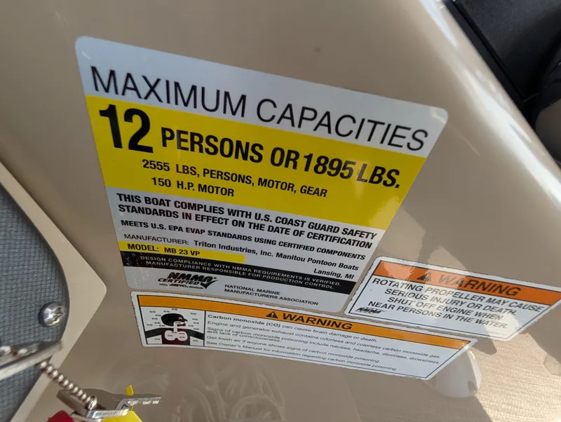 Slide: The Image of 2016 Manitou 23 Aurora capacity label, 12 persons or 1895 lbs, 150 HP motor. - 21