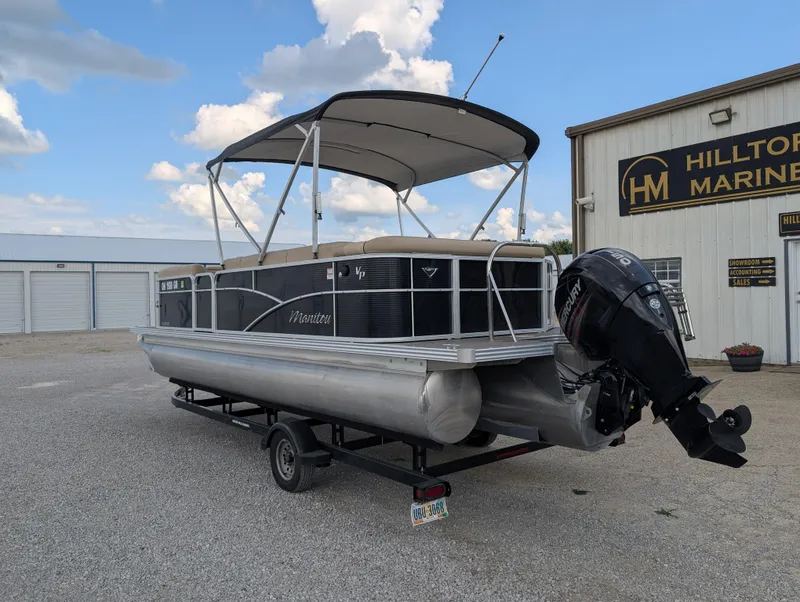Slide: The Image of 2016 Manitou 23 Aurora pontoon boat with canopy and outboard motor at Hilltop Marine. - 8
