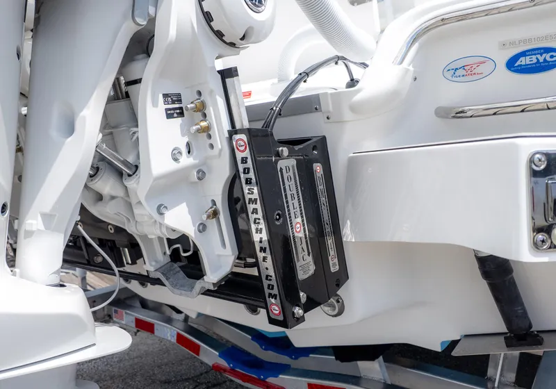 Slide: The Image of Close-up of 2026 Tidewater 2700 Carolina Bay boat engine mount and hydraulic system. - 11