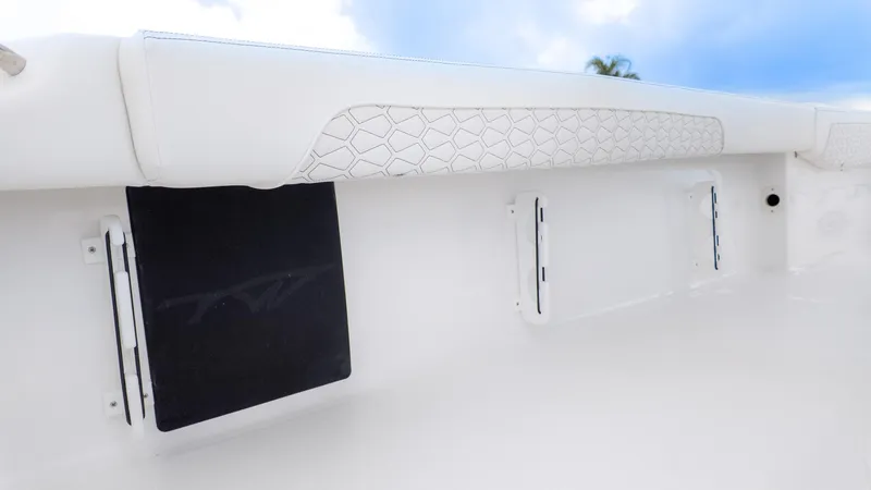 Slide: The Image of 2026 Tidewater 2700 Carolina Bay interior detail with white upholstery and geometric pattern. - 20