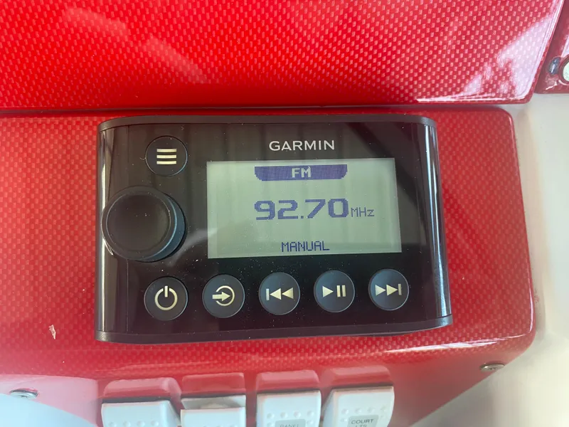 Slide: The Image of Garmin radio display on 2006 Formula 353 FASTech, tuned to 92.70 MHz FM. - 21
