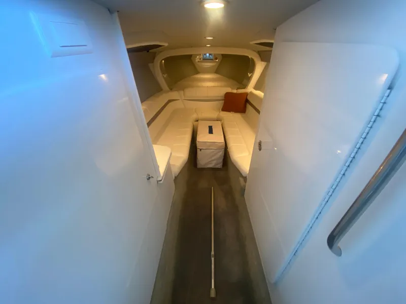 Slide: The Image of Interior of 2006 Formula 353 FASTech boat, featuring white seating and modern design. - 25