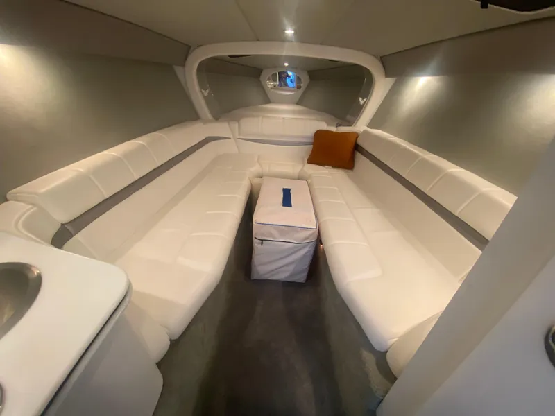 Slide: The Image of Interior of a 2006 Formula 353 FASTech boat with white seating and modern design. - 36