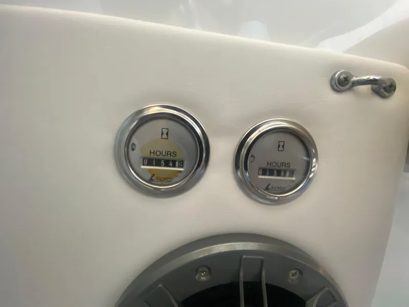 Slide: The Image of 2006 Formula 353 FASTech hour meters displaying 154 and 156 hours. - 40