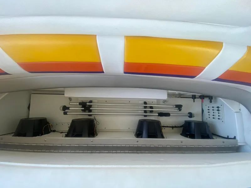Slide: The Image of 2006 Formula 353 FASTech boat interior with colorful upholstery and mechanical components. - 41