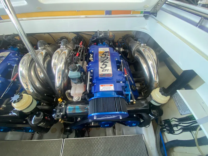 Slide: The Image of 2006 Formula 353 FASTech engine compartment with blue 525 EFI engine. - 45