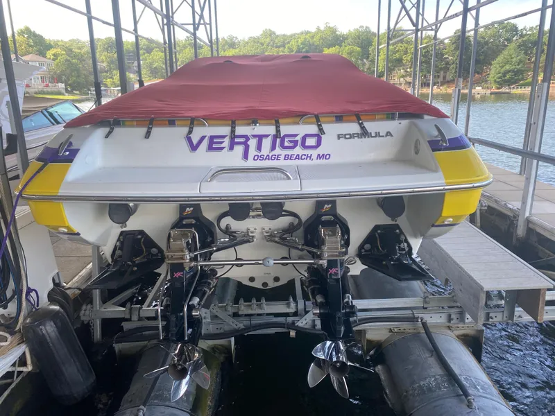 Slide: The Image of 2006 Formula 353 FASTech boat docked, rear view with red cover, Osage Beach, MO. - 49