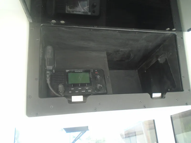 Slide: The Image of 2025 Caymas 291 boat console with Garmin marine radio installed. - 9