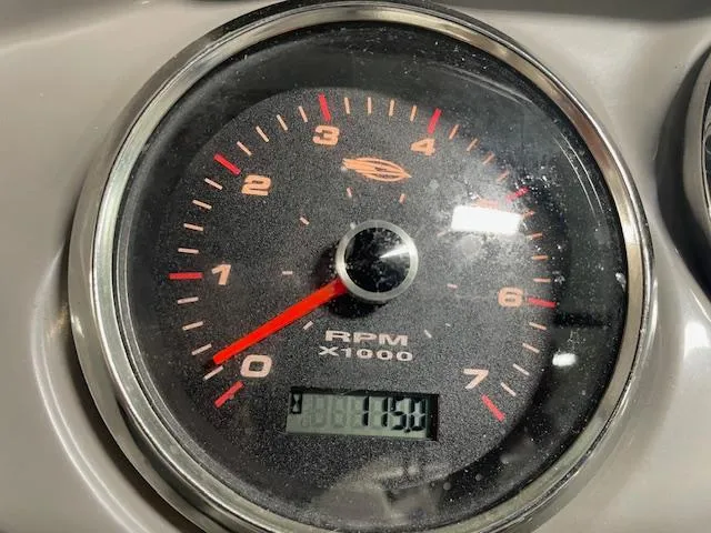 Slide: The Image of Close-up of 2018 Chaparral 21 H2O Sport tachometer showing RPM and digital display. - 13