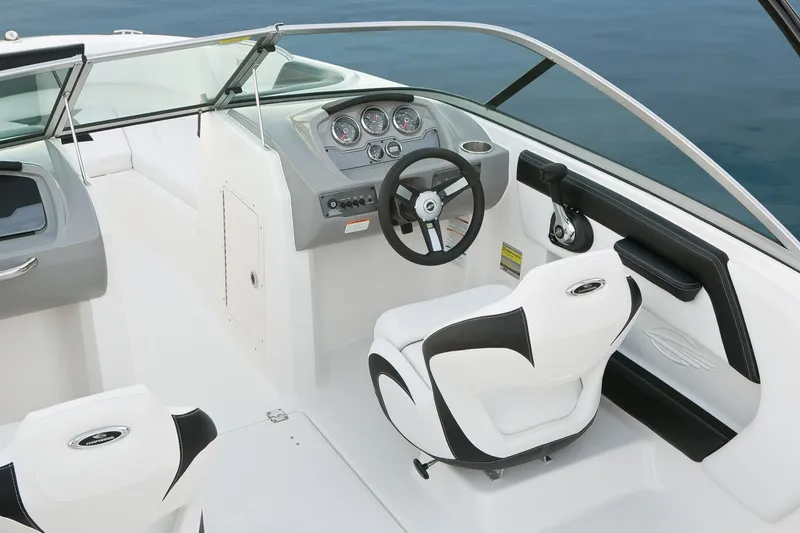 Slide: The Image of Manufacturer Provided Image: 2018 Chaparral 21 H2O Sport boat interior with steering wheel and dashboard. - 17