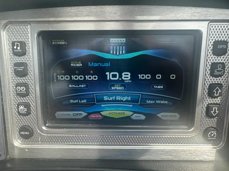 Slide: The Image of 2015 MasterCraft X10 dashboard display showing speed and ballast settings. - 18
