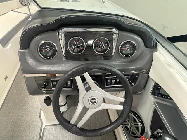 Slide: The Image of Dashboard of 2017 Chaparral 226 SSi boat with steering wheel and gauges. - 11
