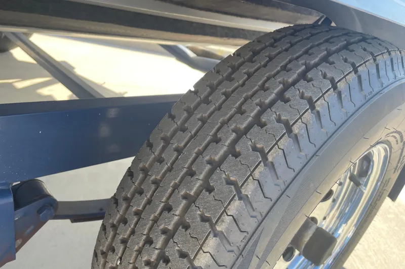 Slide: The Image of Close-up of a 1989 Galaxie 1900 Starion tire with detailed tread pattern. - 19