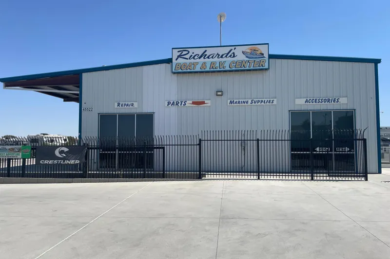 Slide: The Image of Richard's Boat & RV Center building with repair, parts, marine supplies, and accessories signage. - 20