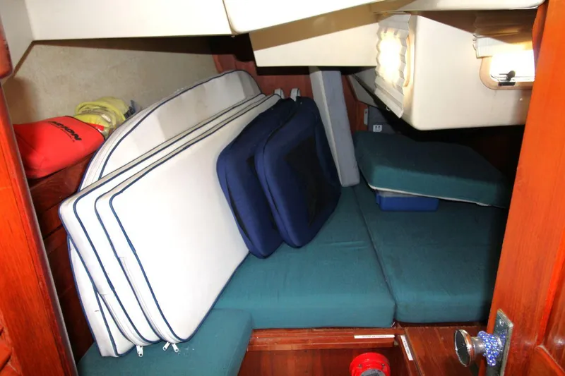 Slide: The Image of Interior cabin of 1989 Pearson 39-2 sailboat with cushions and storage. - 22