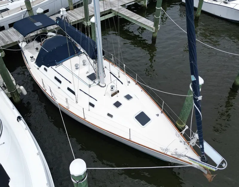 Slide: The Image of 1989 Pearson 39-2 sailboat docked at marina, aerial view. - 5