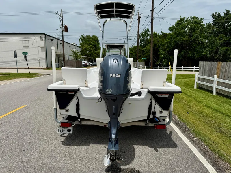 Slide: The Image of 2019 Blazer Bay 1900 boat with Yamaha 115 engine on a street. - 3