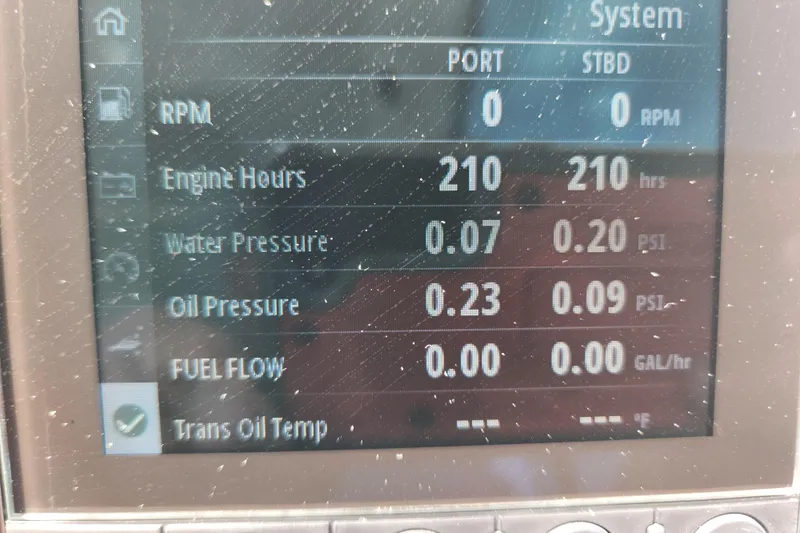 Slide: The Image of Display screen of 2023 Beneteau Gran Turismo 32 showing engine metrics and system status. - 32