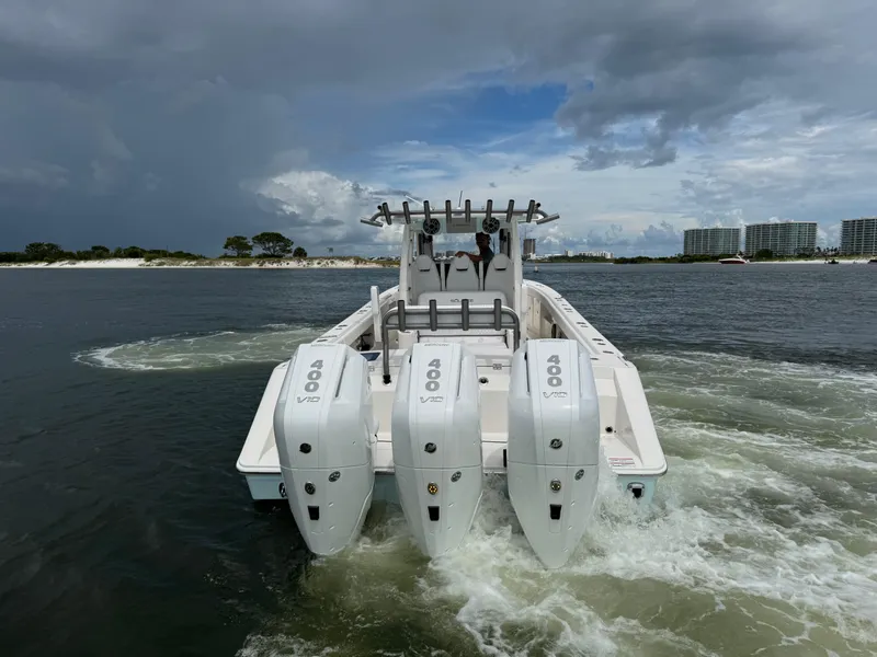 Slide: The Image of 2026 Solace 37 CS boat with triple 400 V10 engines on water. - 10