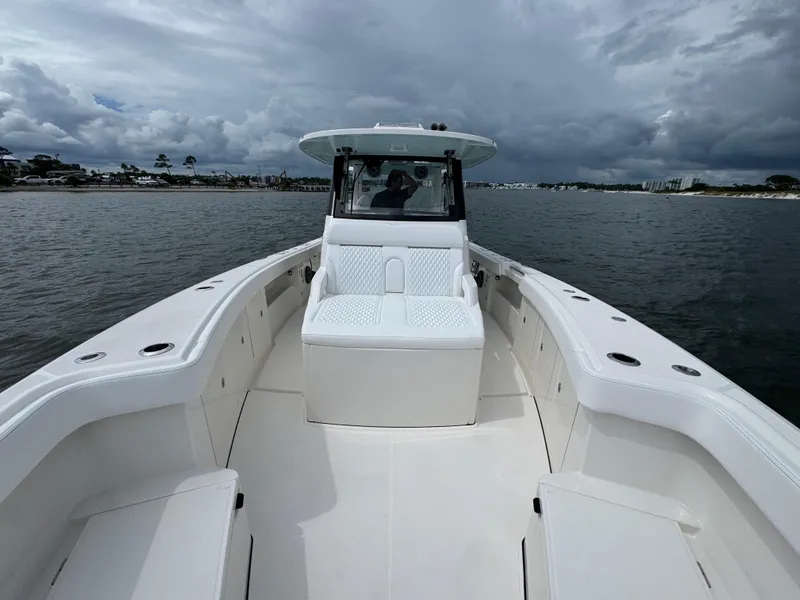 Slide: The Image of 2026 Solace 37 CS boat on water under cloudy sky. - 24