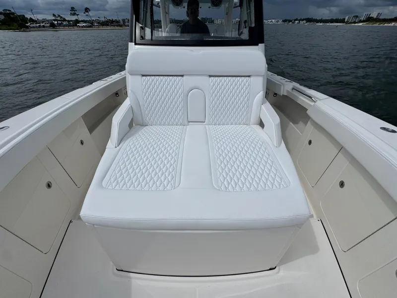 Slide: The Image of Luxurious seating on 2026 Solace 37 CS boat, featuring elegant white upholstery. - 25