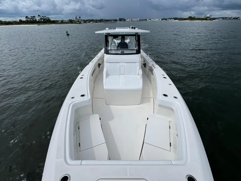 Slide: The Image of 2026 Solace 37 CS boat on water, featuring spacious deck and modern design. - 27