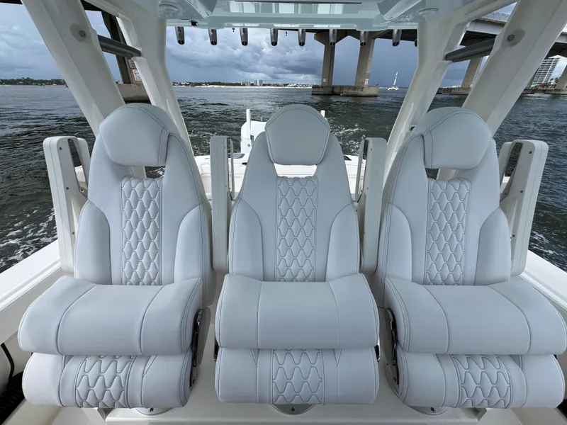 Slide: The Image of Luxury seating on 2026 Solace 37 CS boat, featuring elegant white upholstery and modern design. - 36