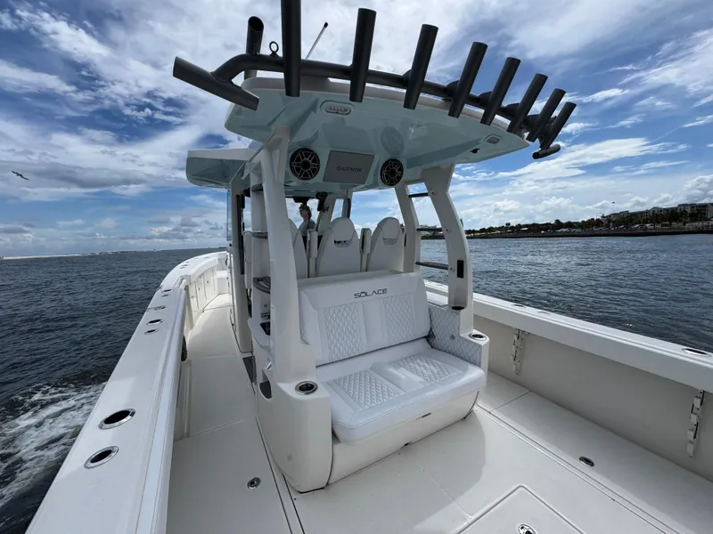 Slide: The Image of 2026 Solace 37 CS boat on water, featuring sleek design and spacious seating. - 42