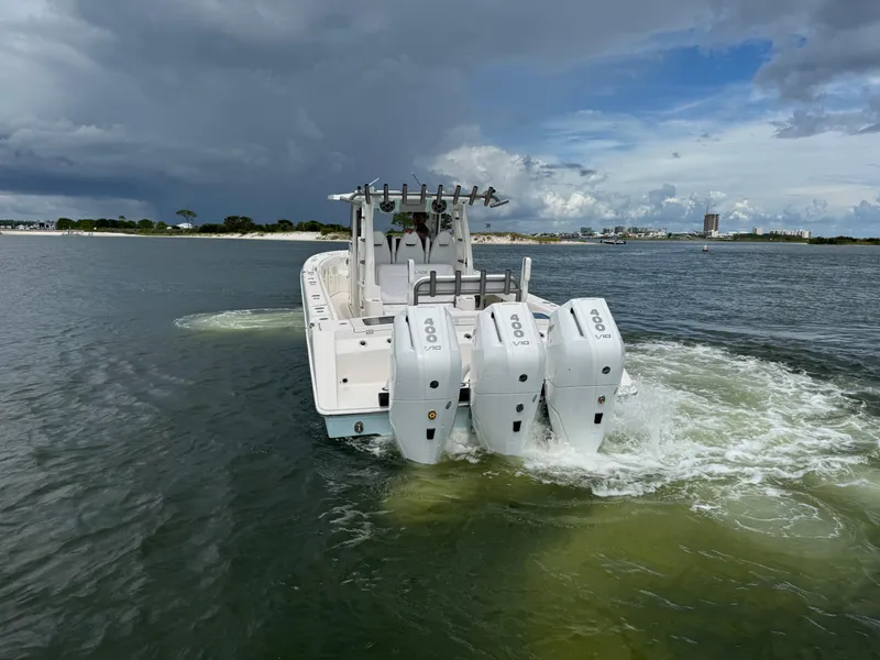 Slide: The Image of 2026 Solace 37 CS boat with triple 400 V10 engines on water. - 8