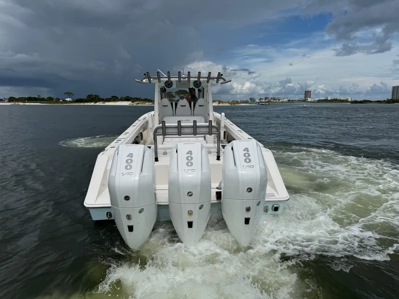 Slide: The Image of 2026 Solace 37 CS boat with triple 400 V10 engines on water. - 9