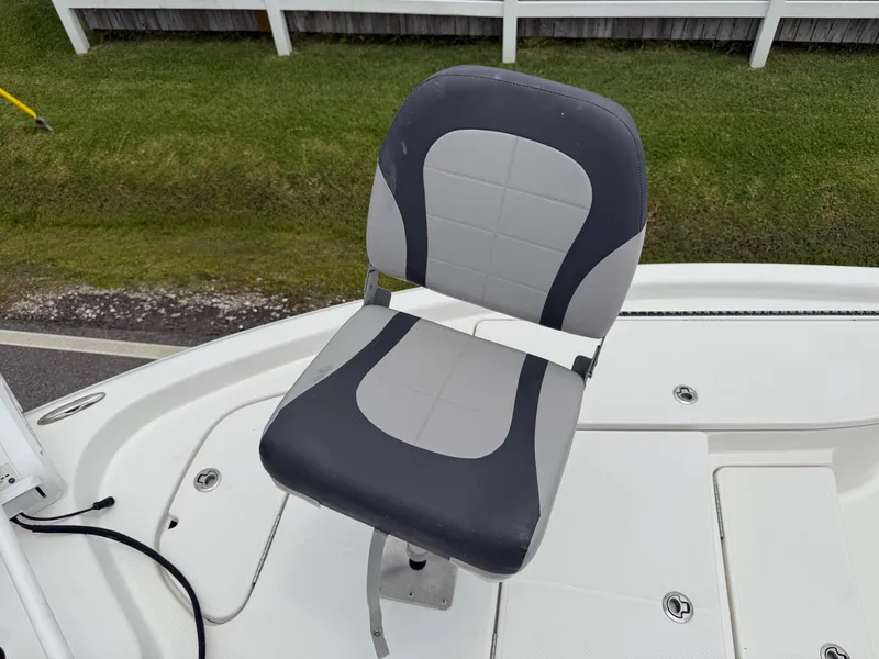 Slide: The Image of Gray and black boat seat on 2017 Blue Wave 2000 PureBay deck. - 18