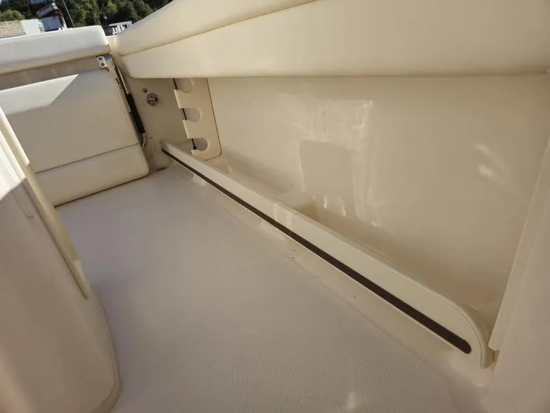 Slide: The Image of 2025 Grady-White Fisherman 236 interior detail, showcasing sleek design and storage features. - 11