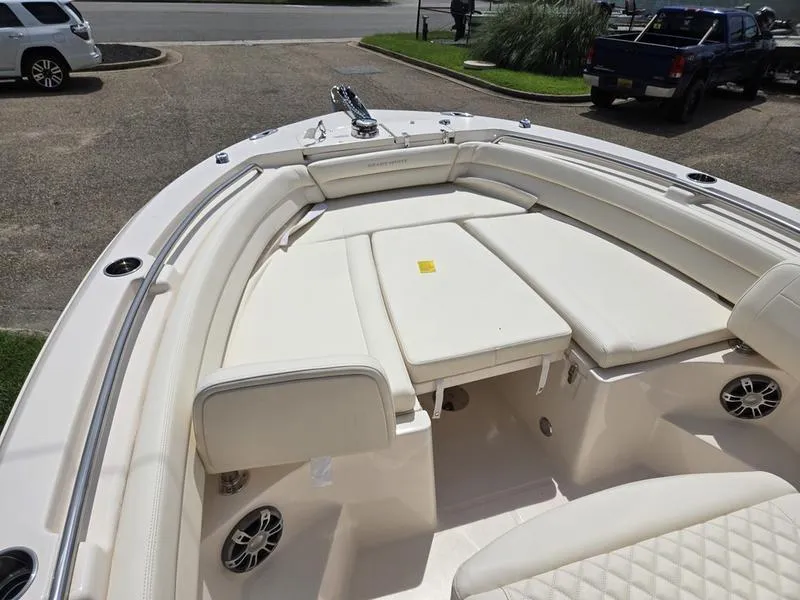 Slide: The Image of 2025 Grady-White Fisherman 236 boat with spacious seating and modern design. - 18