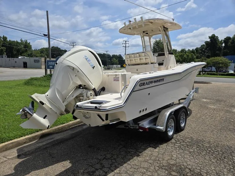 Slide: The Image of 2025 Grady-White Fisherman 236 boat on trailer, featuring Yamaha outboard motor. - 5